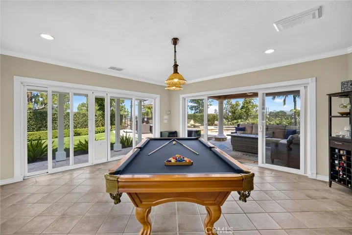 Oversized Family Room/Entertainers Room overlooking pool and spa