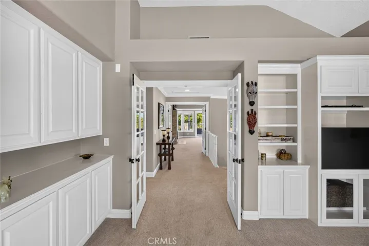 Looking out of bonus room toward main bedroom suite