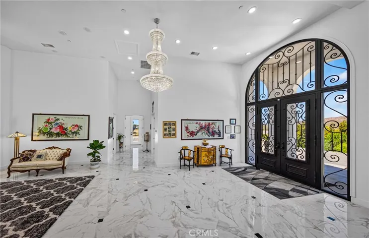 Entry way with primary Chandelier