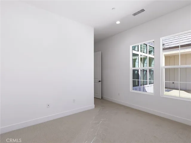 Secondary Bedroom 3: Esen Modern Farmhouse - Bella Terra Collection at Tesoro - Photo of a different homesite of another Esen type floor plan - Not actual home for sale