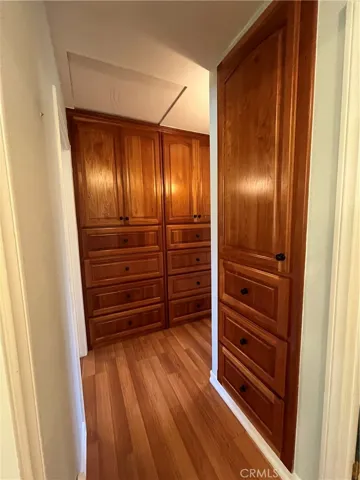 Tons of custom built in storage in hallway.
