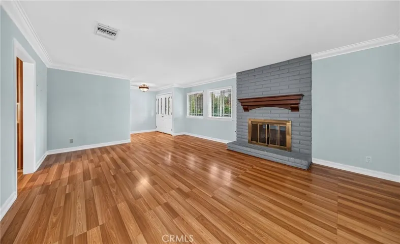 Gas fire place located in living room.