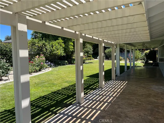Covered back patio oasis.