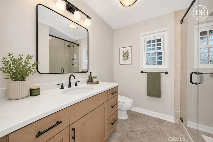 Primary bathroom, virtually enhanced.