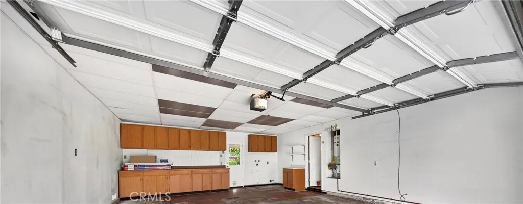 Oversized 2 car garage with built in storage and laundry hook ups.