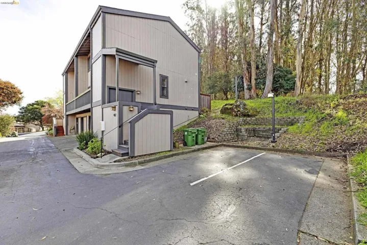 View of front of house featuring uncovered parking