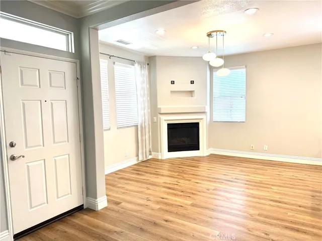 Front door, family room open to the kitchen