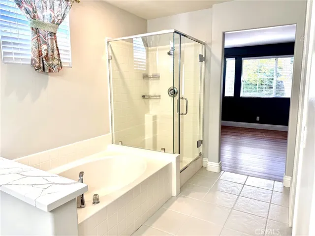 Primary tub/shower and separate room for toilet