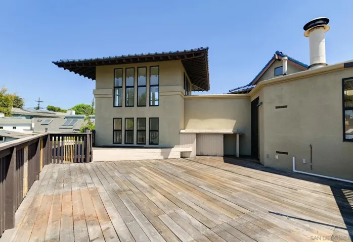 Deck off primary bedroom (facing the rear of the property)