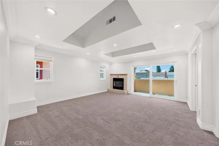 Primary Suite with Fireplace and Balcony