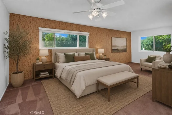 Photo is virtually staged.  Property shows as in previous photo. Upstairs, the generous primary suite offers a peaceful retreat where new vinyl windows frame unobstructed views of the treetops, surrounding hillsides, and West Hills​​‌​​​​‌​​‌‌​​‌​​​‌‌​​​‌​​‌‌​​‌‌​​‌‌​​​​ neighborhoods.