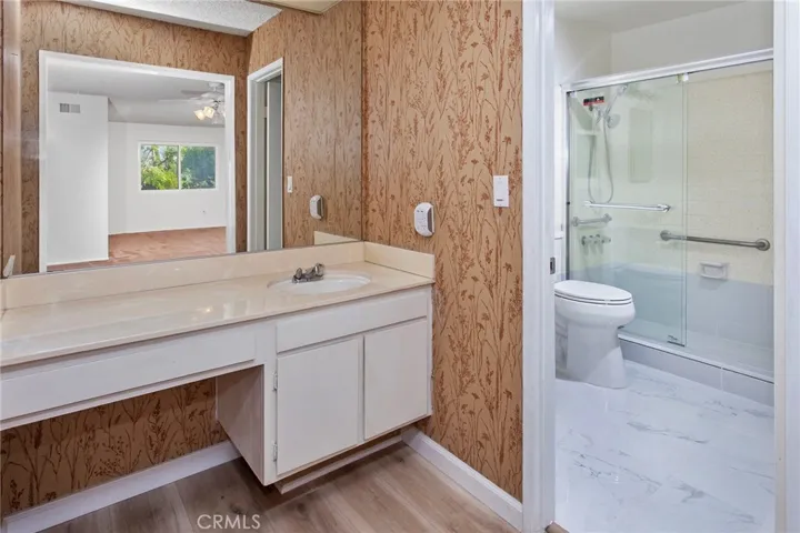 The remodeled primary bath provides both comfort and functionality.