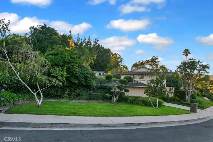 Set on nearly a quarter of an acre with generous separation from the street and neighboring homes, this West Hills property offers a setting where privacy, space, and views come naturally. The expansive lot offers the opportunity to further enhance an already private outdoor setting while enjoying a welcome sense of space, privacy, and room to breathe.