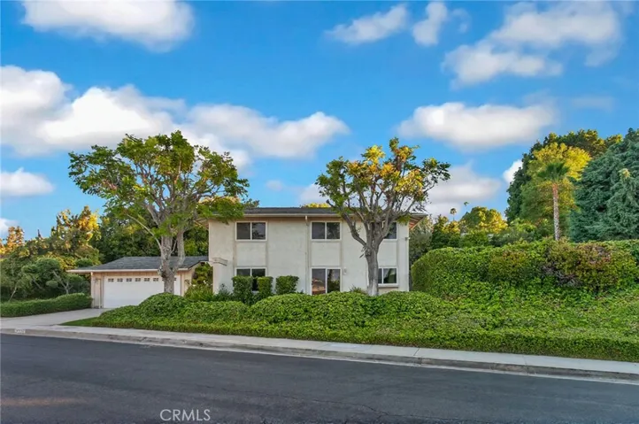 Set on nearly a quarter of an acre with generous separation from the street and neighboring homes, this West Hills property offers a setting where privacy, space, and views come naturally. The expansive lot offers the opportunity to further enhance an already private outdoor setting while enjoying a welcome sense of space, privacy, and room to breathe.