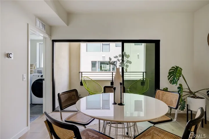 2nd Floor - Dining Area + Balcony + Laundry Room