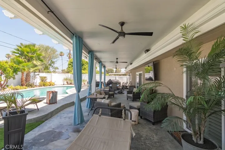 whole house covered patio with custom fans and lighting