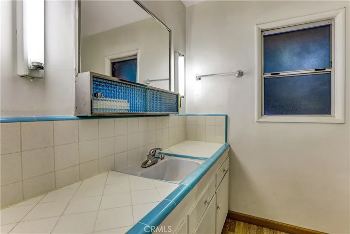 Original, but very well kept tile vanity