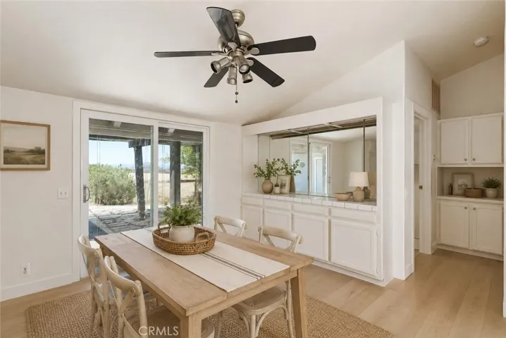 Dining Room virtually staged with different flooring.