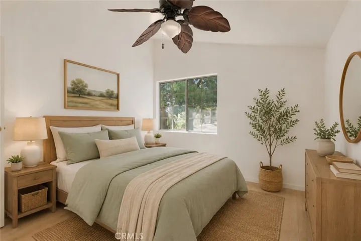 Virtually staged bedroom 3 shown with flooring.