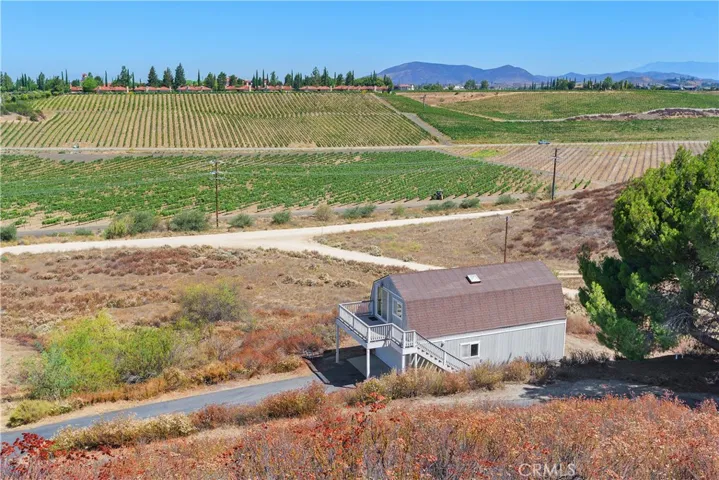 Deck views facing the cabanas at South Coast Windery and beautiful vineyard views!