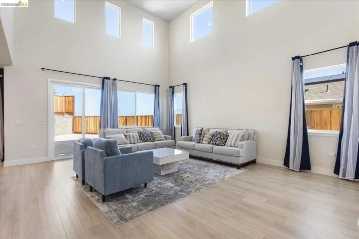 Vaulted ceilings accentuating multiple high-set windows