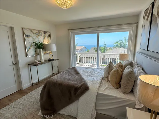2nd bedroom has patio door open to balcony