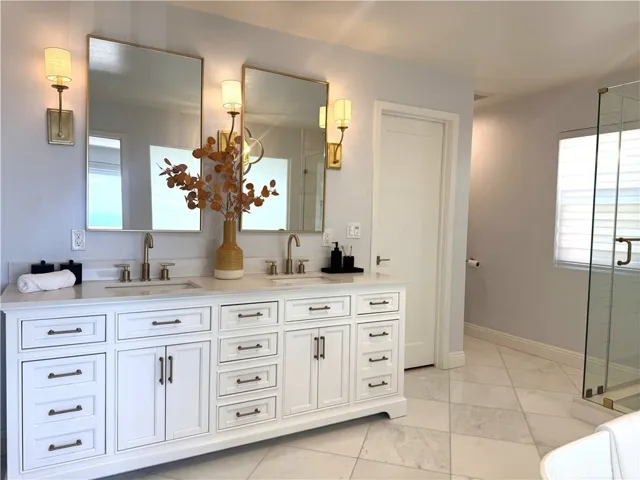 Master bathroom has marble flooring