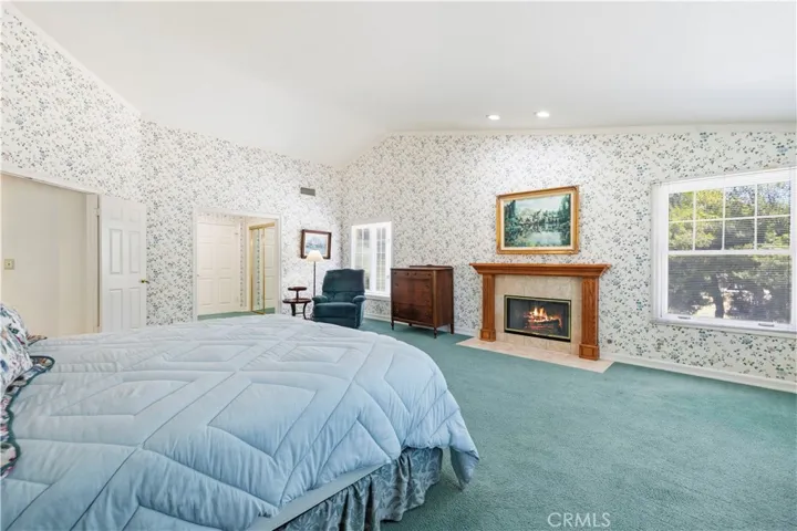 bedroom #2 - primary w/virtual flame