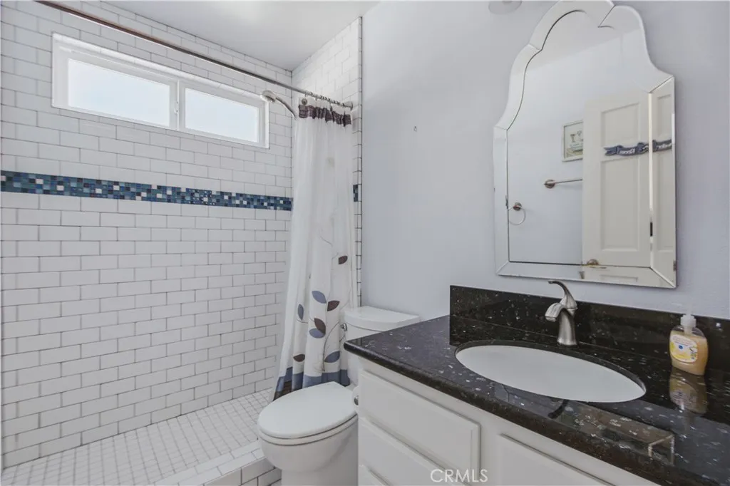 Guest bathroom incluidng walk in shower.
