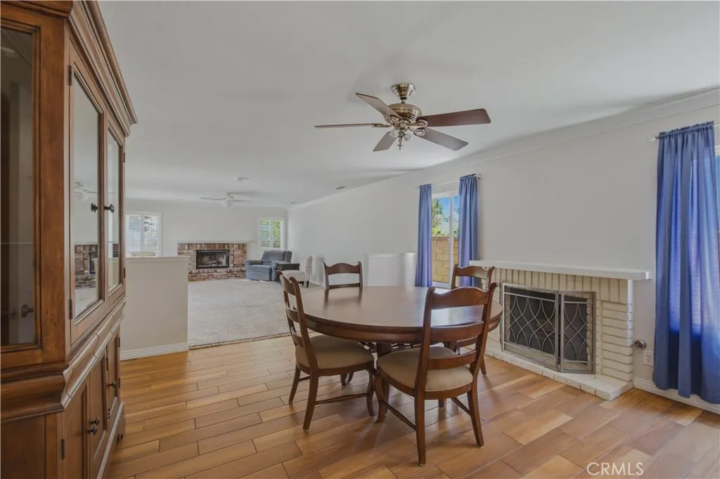 Another view of dining room area leading into family room.
