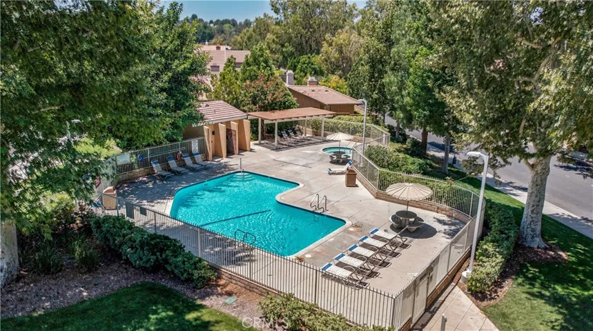 Arial view of neighborhood pool and spa.