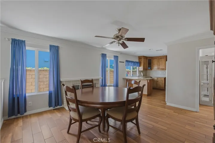 Another view of dining and kitchen from family room.