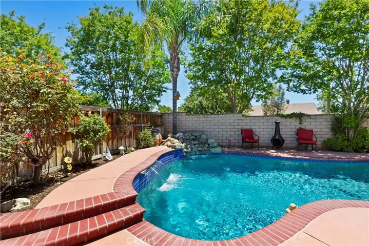 Rock waterfall and pool waterfall feature.