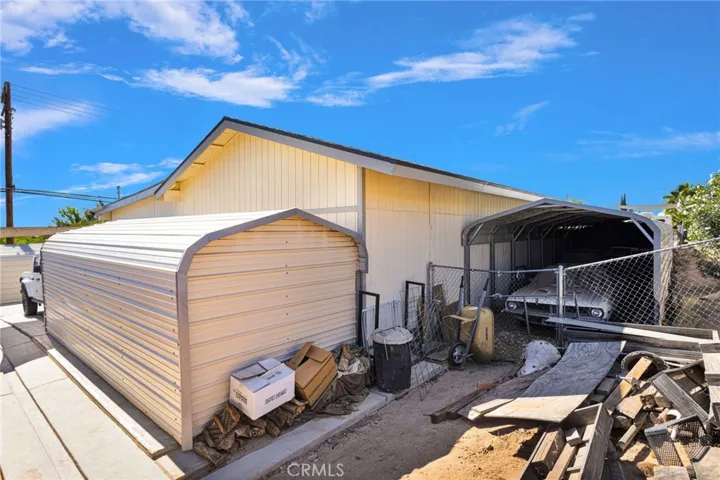 Behind Detached Garage/Worshop. Car/Boat covered parking