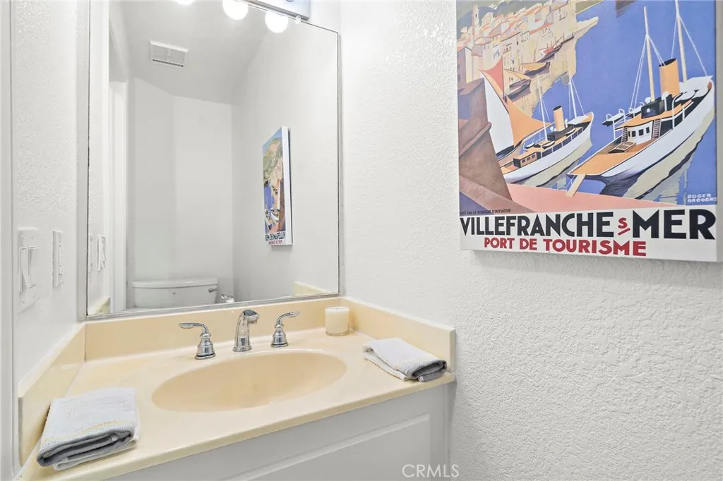 Conveniently located 1/2 bath between Living Room and Kitchen.