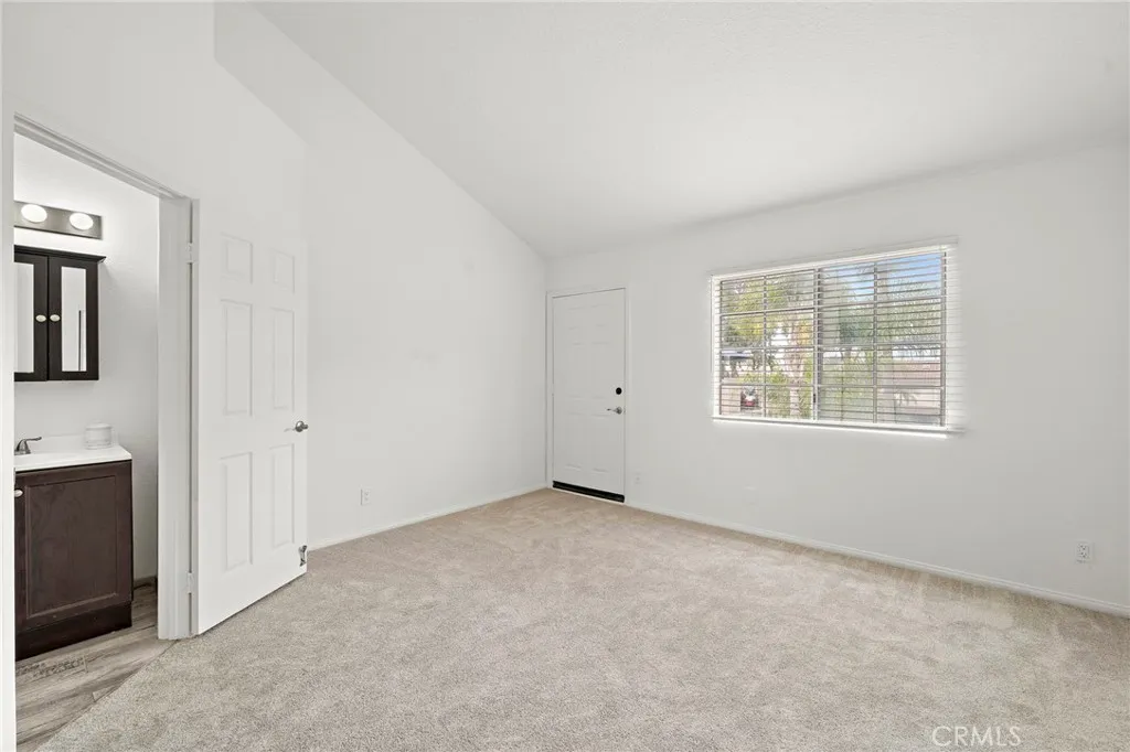 Second primary suite has separate access door to outside entrance.