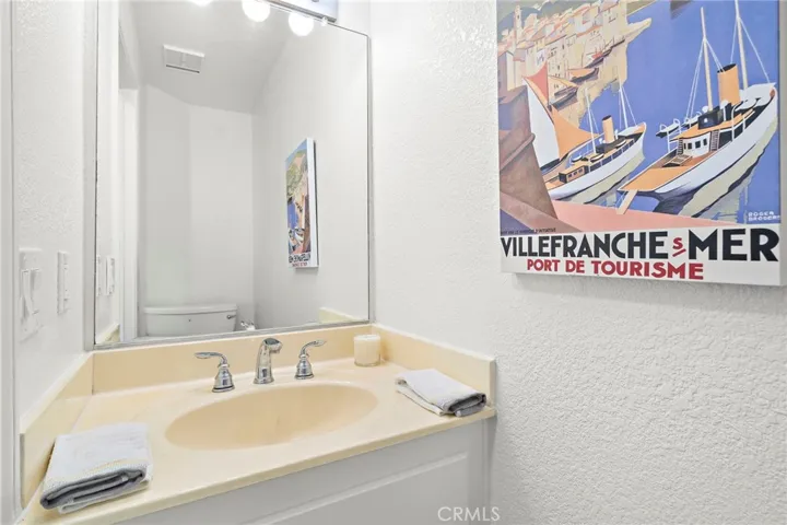 Conveniently located 1/2 bath between Living Room and Kitchen.