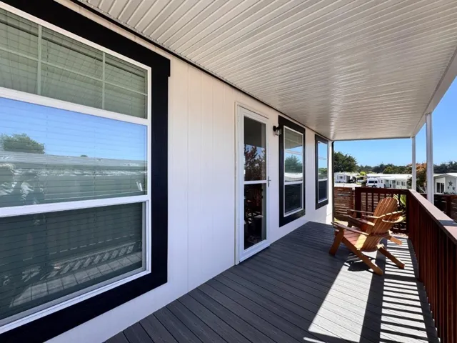 Covered front porch; great for sunsets!