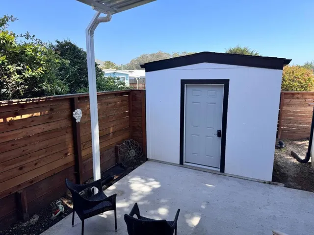 Extra tall shed.  Hardi-board siding.