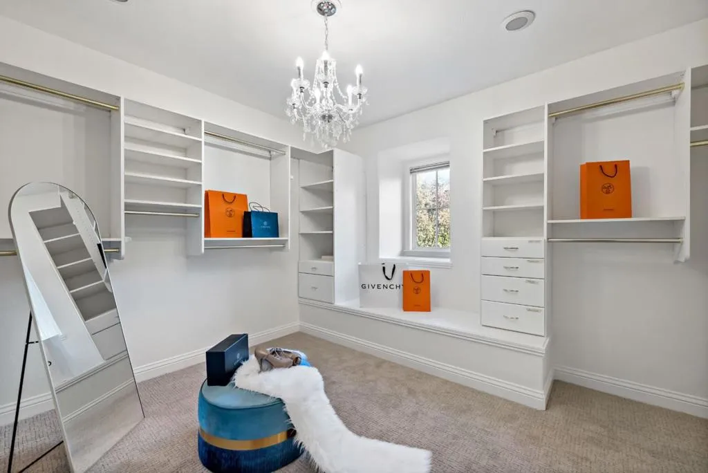 Tremendous Master Walk-In Closet with Built in Organizers