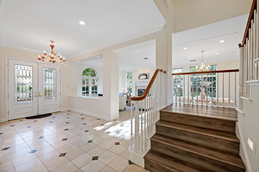 Dual Entry Staircase from Foyer and Kitchen