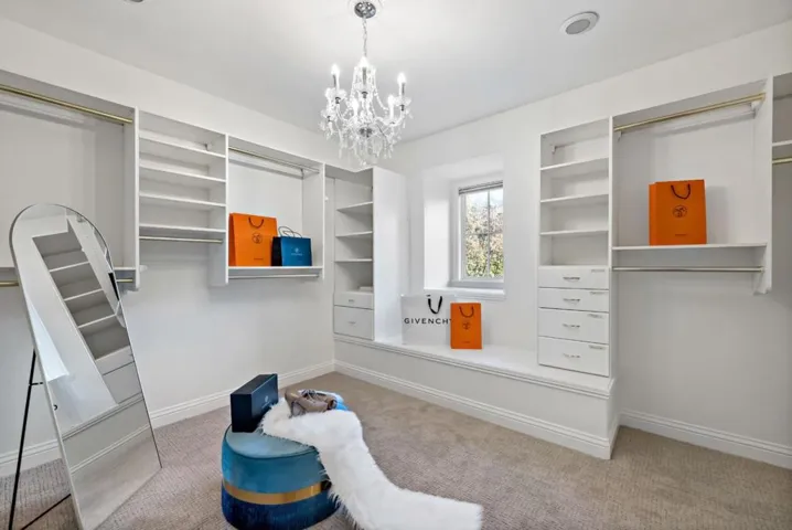 Tremendous Master Walk-In Closet with Built in Organizers