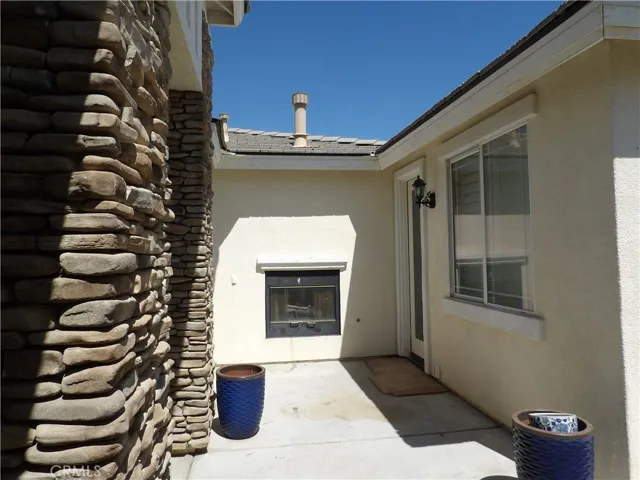 Fireplace in front area, right outside the casita(5th bedroom)