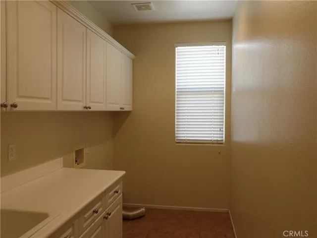 Spacious laundry room.