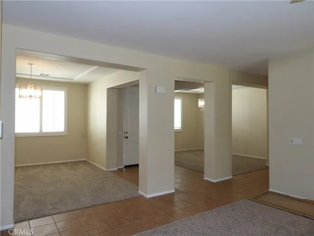 Looking from the family room, towards the living and formal dining areas.
