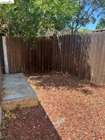 Back yard behind garage