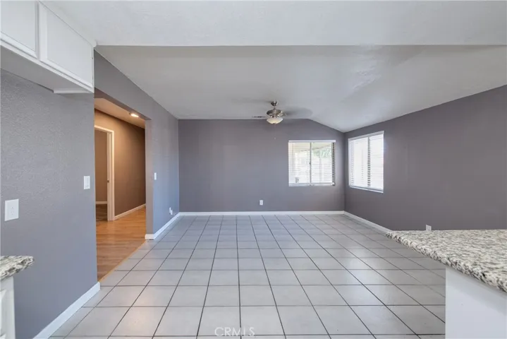 The dining room has plenty of room for entertaining and overlooks the front​​‌​​​​‌​​‌‌​​‌​​​‌‌​​​‌​​‌‌​​‌‌​​‌‌​​​​ yard.