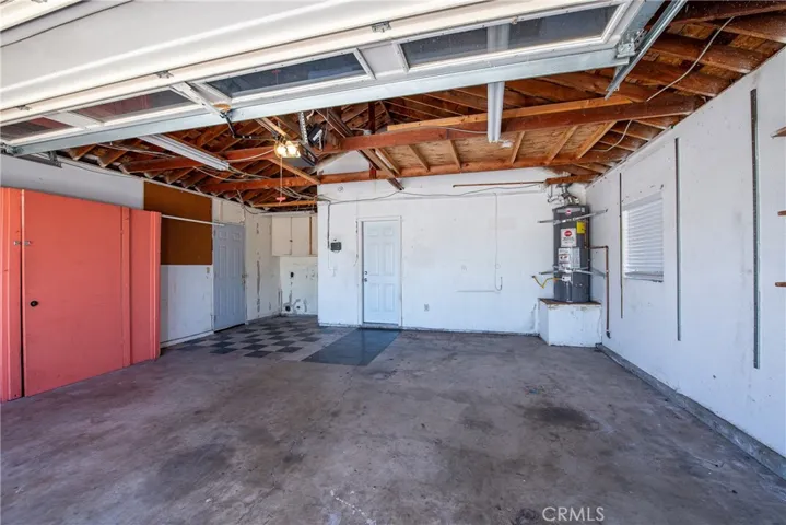 The laundry hookups are in the large attached two car garage that has plenty of room for parking and storage as well.