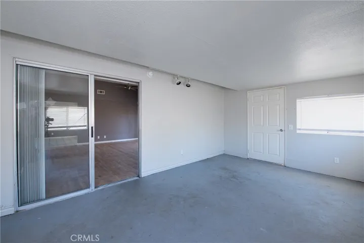 The sunroom offers endless possiblities such as a home office, exercise room, playroom, hobby space or whatever you can imagine.