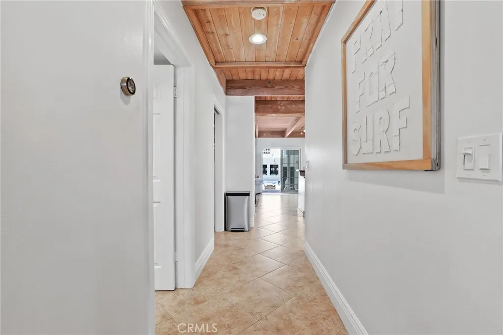 Hall to kitchen, powder room, lower lever and family room
